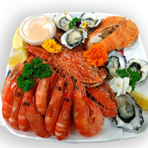 Enjoy a seafood platter overlooking the river.